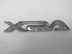 Эмблема для Mitsubishi ASX 2010>, OEM 7415A443 - вид 2 (фото)