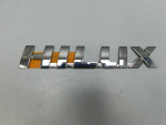 Эмблема для Toyota Hilux 2015>, OEM 754270K110 - вид 1 (фото)