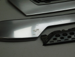 Накладка на решетку радиатора для Mitsubishi Outlander 2012>, OEM 7450B298 - вид 3 (фото)