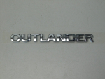 Эмблема для Mitsubishi Outlander 2012>, OEM 7415A401 - вид 1 (фото)