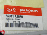 Эмблема для Kia Cerato 2013-2018, OEM 86311A7030 - вид 2 (фото)
