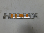 Эмблема для Toyota Hilux 2005-2015, OEM 754270K010 - вид 1 (фото)