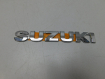 Эмблема для Suzuki SX4 2013>, OEM 7782179J000PG - вид 1 (фото)