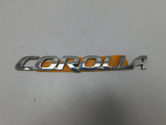Эмблема для Toyota Corolla E15 2006-2013, OEM 75442-12A11 - вид 1 (фото)