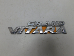 Эмблема для Suzuki Grand Vitara 2006>, OEM 7784165J100PG - вид 1 (фото)