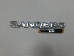 Эмблема для Renault Sandero 2009>, OEM 8200825013 - вид 1 (фото)