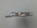 Эмблема для Honda Jazz 2002>, OEM 75722-SAA-E00 - вид 1 (фото)