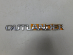 Эмблема для Mitsubishi Outlander 2012>, OEM 7415A401 - вид 1 (фото)