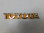 Эмблема для Toyota Camry V50 2011-2018, OEM 75447-33140 - вид 1 (фото)