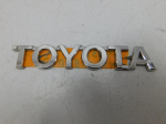 Эмблема для Toyota Highlander II 2007-2013, OEM 7544248090 - вид 1 (фото)