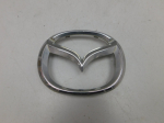 Эмблема для Mazda 6 (GJ/GL) 2013>, OEM G46L51730 - вид 1 (фото)